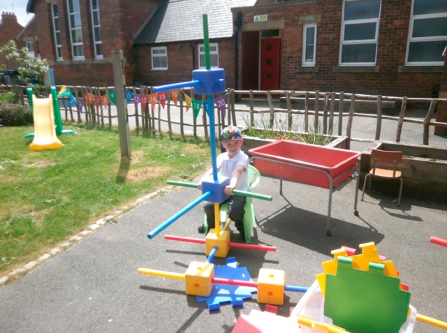 Driving a formula one car we made with the large construction.