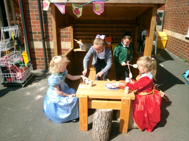 Reception class serving tea for our princess guests.